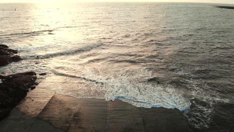 gorai-beach-dock-waves-on-sun-set-dron-shot