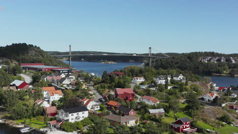 Aerial-Rising-View-of-Tromoy-Bridge-and-Island-from-Norway-Mainland