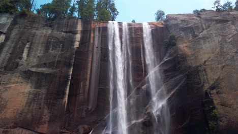 Slow-tilting-up-shot-from-rock-in-foreground-to-reveal-Vernal-Falls