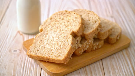 sliced-wholegrain-bread-on-a-wooden-table