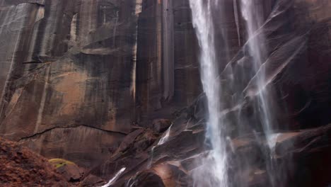 Slow-panning-shot-from-rock-in-foreground-to-reveal-Vernal-Falls