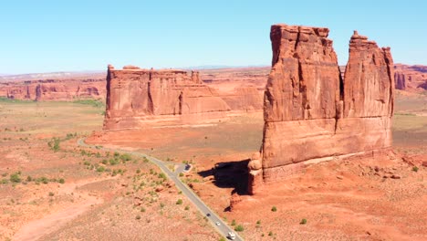 4K-aerial-of-rock-formations-in-a-desert-landscape---Arches-National-Park,-Utah,-USA