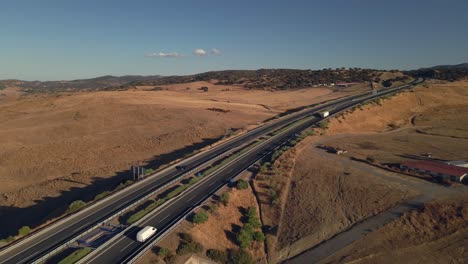Aerial-view-of-an-highway-at-the-arid-mountains