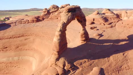 4K-aerial-of-Delicate-Arch-in-Arches-National-Park,-Utah,-USA