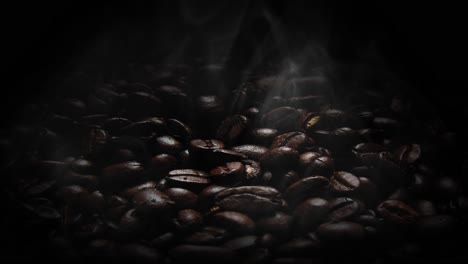 zoom-out,-the-coffee-beans-are-still-hot,-with-the-smoke-from-the-coffee-beans