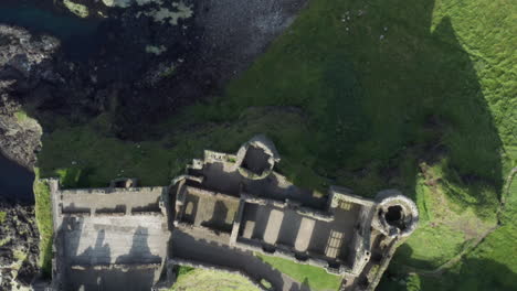 Dramatic-aerial-view-of-Dunluce-Castle-in-County-Antrim-Northern-Ireland