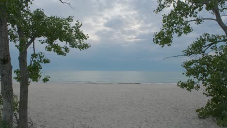 Shot-from-the-cloudy-sky-to-the-beautiful-North-Beach-on-Lake-Ontario