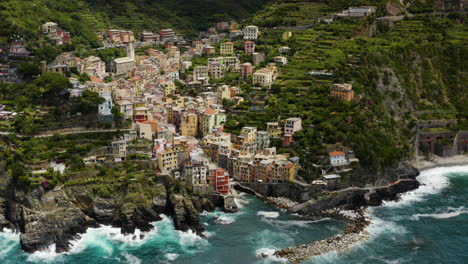 Flying-towards-Riomaggiore-village-on-cliffs-of-Italy