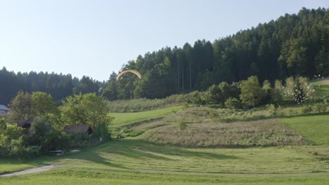 Enthralling-paragliding-landing-touch-down-moment-at-Slovenj-Gradec-wide