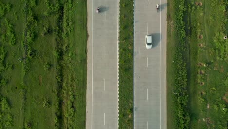 Amazing-drone-view-of-the-empty-highway-in-Punjab-province,-INDIA
