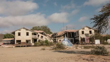 Timelapse-shot-of-an-abandoned-scary-stroyed-house-in-4k,-shot-near-the-beautiful-beach-of-Lobitos,-Peru-desert