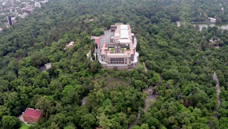 Aerial-Chapultepec-Castle-on-the-hill-park-next-to-the-Chapultepec-lake-in-Mexico-City-in-daytime
