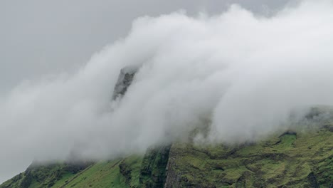 Motion-Timelapse-Of-Clouds-On-The-Mountain-Peak-In-Iceland-Blown-By-The-Wind---close-up