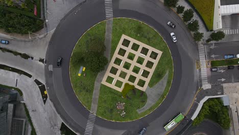 Lift-up-Aerial-view-of-green-roundabout-Santa-Fe-Mexico-City-with-light-traffic-due-to-COVID19-lockdown