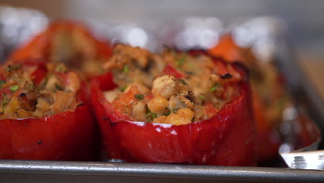 Panning-slowly-along-a-row-of-freshly-baked-stuffed-sweet-bell-peppers---temptingly-appetizing