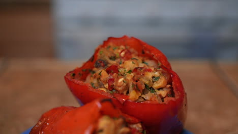 Close-up-of-a-tantalizing-pair-of-stuffed-red-bell-peppers-ready-to-eat