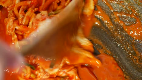 POV-to-the-pot-full-of-korean-food--heated-kimchi-soup