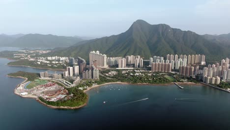 Aerial-view-of-Hong-Kong-Wu-Kai-Sha-area-with-modern-residential-building-complex-and-Tolo-Harbour-open-bay