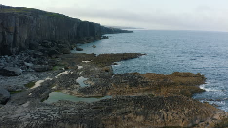 Aerial-view-of-the-cliffs-at-Ailladie-located-in-the-Burren-on-the-west-coast-of-Ireland