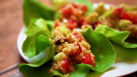 Macro-view-of-lettuce-wraps-or-cups-on-a-plate-and-ready-to-serve---focus-pull