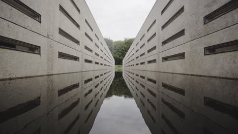 Reflection-Of-Concrete-Deltawerk,-A-Former-Hydraulic-Experimental-Facility-In-Waterloopbos-Marknesse,-Netherlands