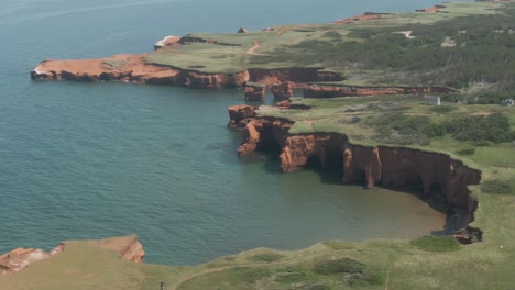 The-Magdalen-Islands-With-Lush-Green-Meadow-And-Fields-By-The-Saint-Lawrence-River-In-Northern-Quebec,-Canada