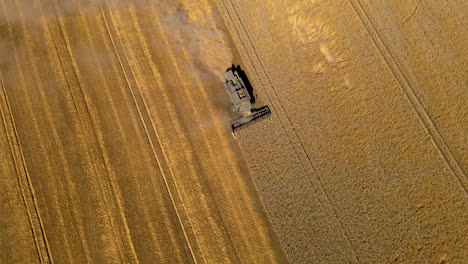 Harvesting-Machinery-Working-On-A-Pasture-Land-In-Puck,-Poland