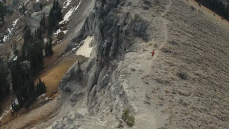 Trail-runner-jogging-on-steep-mountain,-Reno,-Nevada,-birds-eye-view