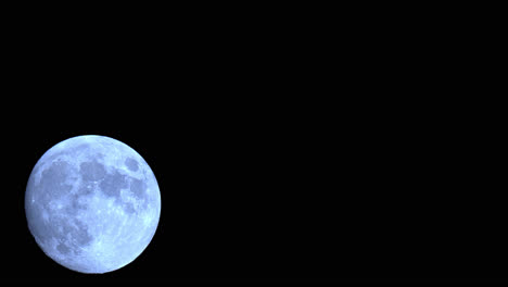 Full-Moon-Time-Lapse,-Rising-In-The-Dark-Night-Sky