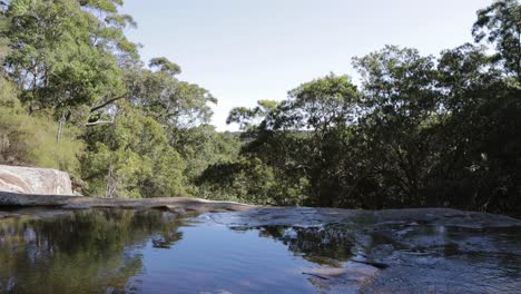 Top-of-Somersby-waterfalls-near-Sydney-Australia-in-the-Brisbane-Water-National-Park,-Locked-shot