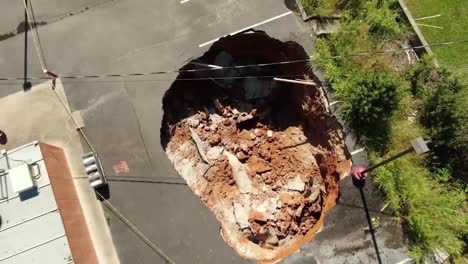 DRONE-SHOT-STRAIGHT-DOWN-A-SINKHOLE-IN-PARKING-LOT