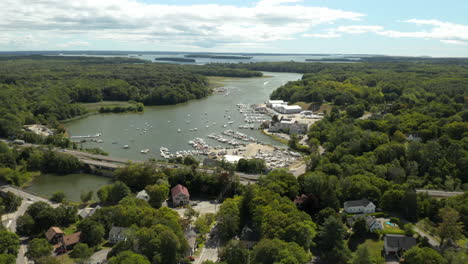 Fly-Over-Reveal-Drone-Footage-at-Yarmouth-Downtown,-Maine,-overlooking-boat-docks