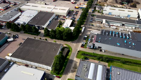 Aerial-of-truck-driving-over-large-industrial-terrain