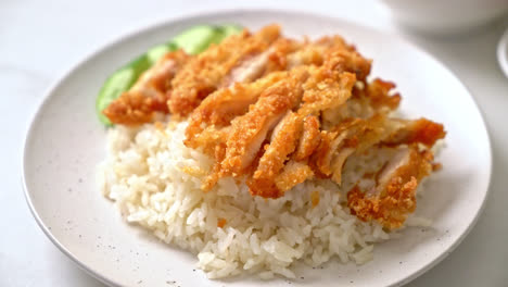 Hainanese-chicken-rice-with-fried-chicken-or-rice-steamed-chicken-soup-with-fried-chicken---Asian-food-style