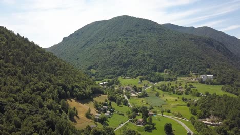Aerial-of-a-beautiful-green-location-in-the-Italian-Dolomites,-Premana