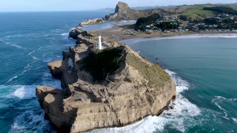 Lighthouse-at-Castlepoint-in-New-Zealand---Rotating-Aerial-Drone-View