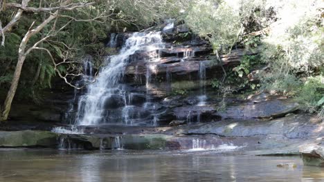 Wide-shot-of-Somersby-falls-near-Sydney-Australia-in-the-Brisbane-Water-National-Park,-Locked-shot