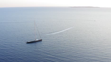 Aerial-shot-of-a-modern-sailboat-in-the-mediterranean-ocean