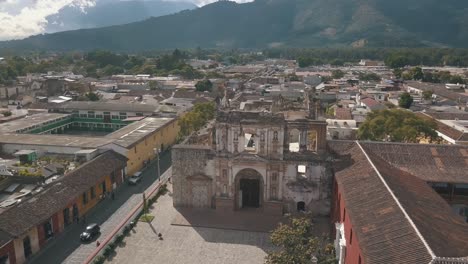 Drone-aerial-over-the-ruins-of-San-Lucas-church-in-Antigua,-Guatemala,-destroyed-by-earthquakes