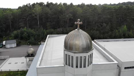 Aerial-of-a-Syrian-Orthodox-in-Gothenburg-with-metal-globe-and-cross-on-top