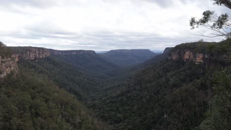Fitzroy-Falls-valley-gorge-in-the-Kangaroo-Valley-National-Park-Australia,-Locked-wide-shot