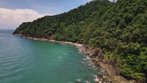 drown-slow-dolly-shot-of-tropical-Island-coastline-with-jungle-beach-and-ocean-in-Thailand