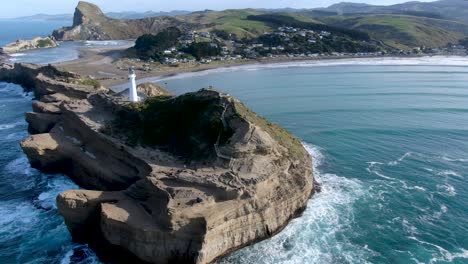 Lighthouse-Landmark-at-Castlepoint-on-North-Island-of-New-Zealand---Aerial-Circling-View