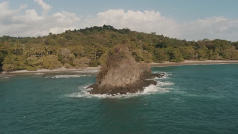 Cinematic-Drone-aerial-of-rock-formations-in-the-sea-of-Costa-Rica