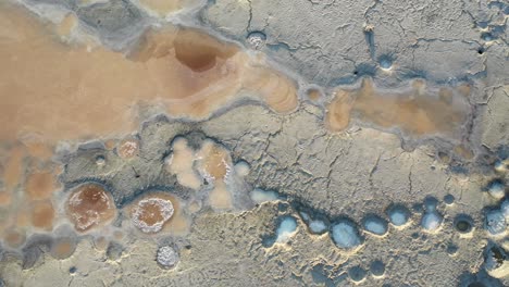 Top-Down-Aerial-View,-Salt-Flats-Patterns,-Solar-Evaporation,-Mineral-Harvesting-by-Great-Salt-Lake-in-Utah-USA