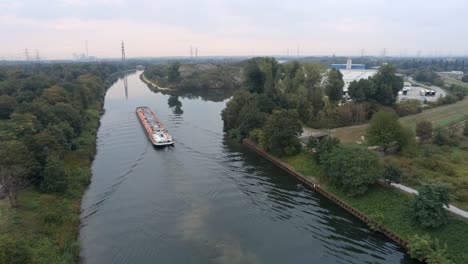 Aerial-view-of-tanker-barge-navigating-up-the-rhine-herne-canal