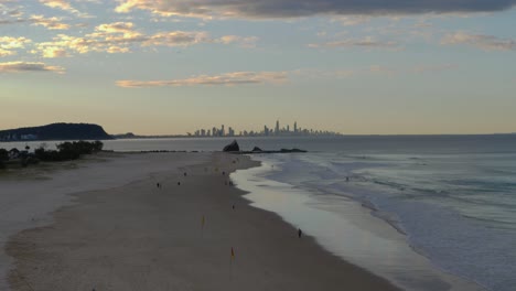 Quiet-walks-on-the-Currumbin-Beach-during-sunset---Gold-Coast-QLD-Australia