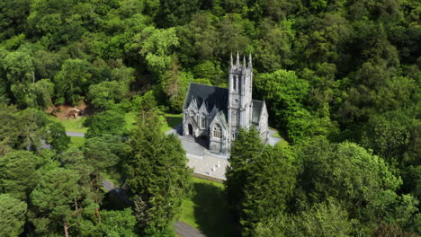 Ireland-Tourist-Destination---Kylemore-Abbey-Castle-Buildings---Victorian-Walled-Gardens,-Aerial-Drone-Overhead-View