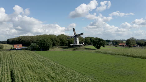 Flying-up-to-traditional-windmill-with-rotating-blades