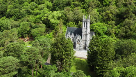 Ireland---Magnificent-Historical-Landmark,-Kylemore-Abbey-Castle,-Aerial-Drone-Overhead-View